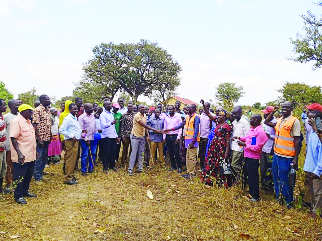 Emmanuel Ojirot, the deputy RDC of Kapelebyong handing over the site to the contractor
