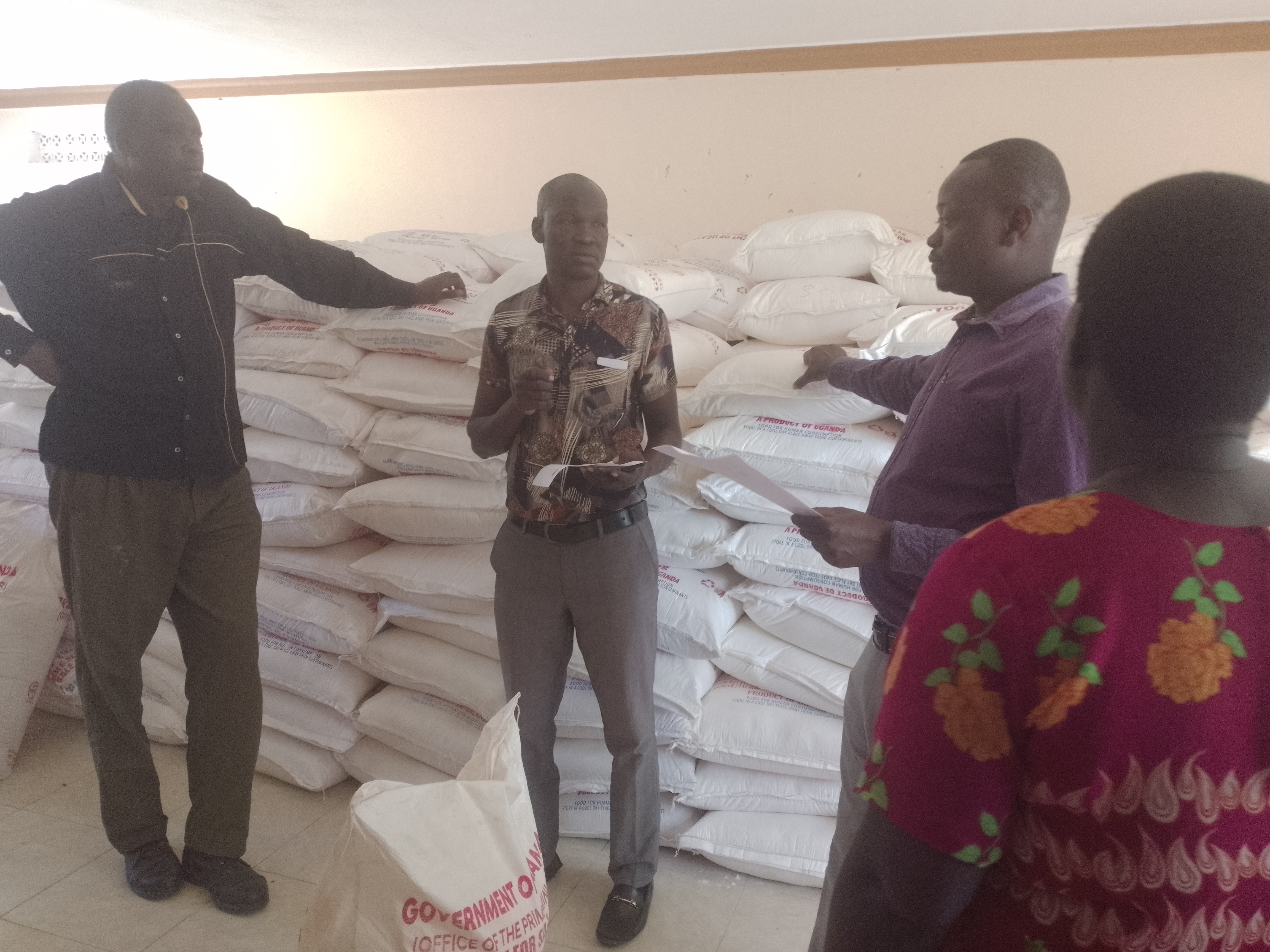 Emmy Ojirot, the deputy RDC of Kapelebyong (third right) officiating the distribution of relief to subcounty authorities at Kapelebyong TC hall on Friday last. Photo by Emmanuel Opio Emmy Ojirot, the deputy RDC of Kapelebyong (third right) officiating the distribution of relief to subcounty authorities at Kapelebyong TC hall on Friday last. Photo by Emmanuel Opio.