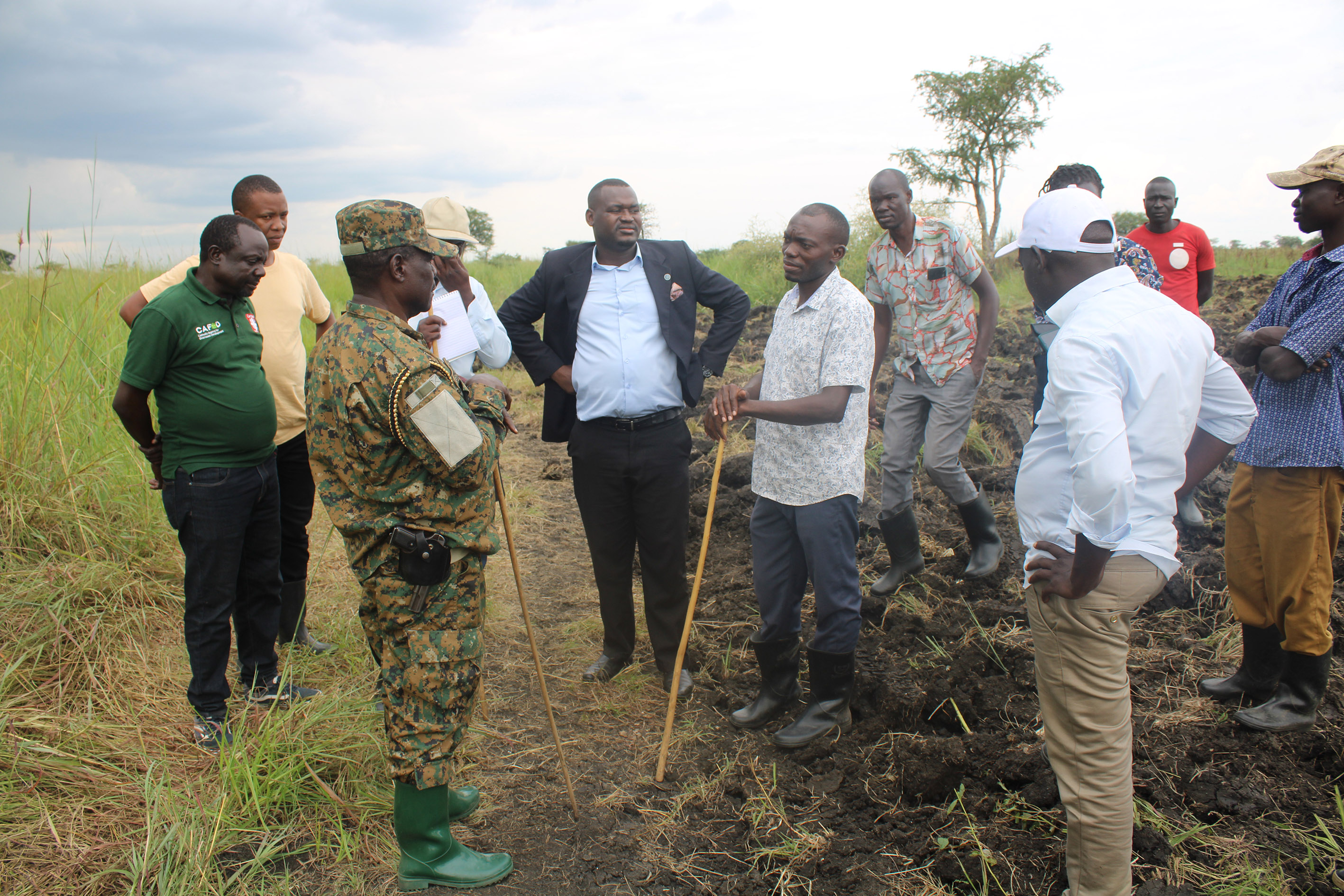 District and UPDF leaders interacting in the bush District and UPDF leaders interacting in the bush