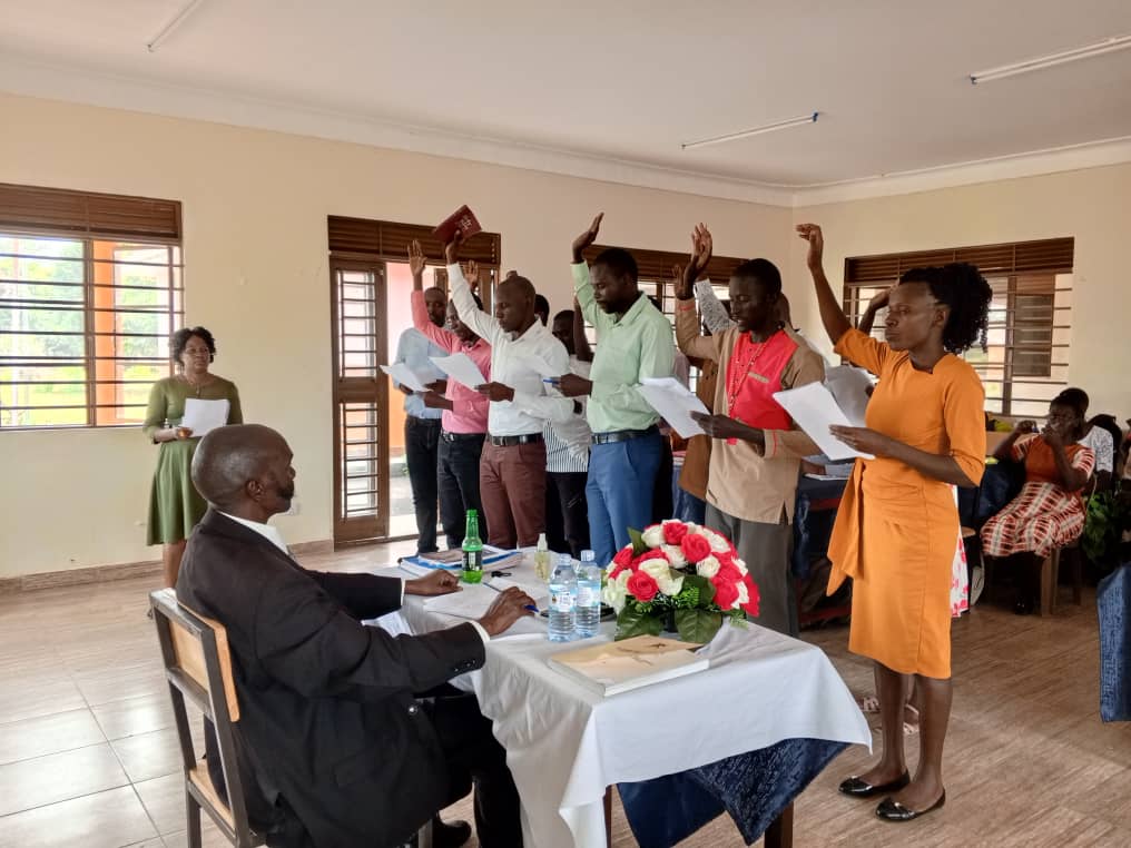 he new employs of Kapelebyong district taking oath which was administered by Mr. Shaineh Nelson, the deputy CAO (sitted) in district council hall on Wednesday last week. Photo by Emmanuel Opio he new employs of Kapelebyong district taking oath which was administered by Mr. Shaineh Nelson, the deputy CAO (sitted) in district council hall on Wednesday last week. Photo by Emmanuel Opio